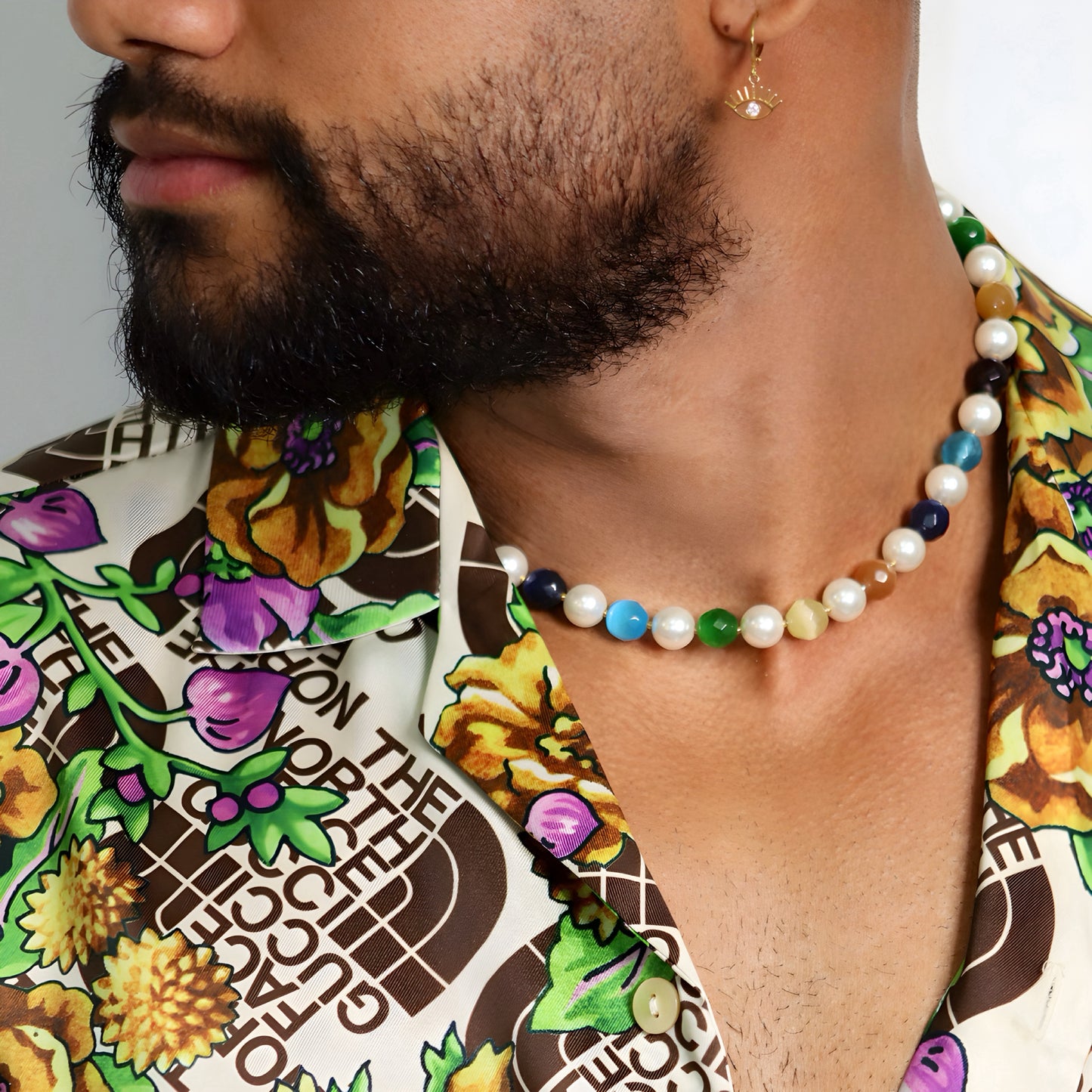 Necklace crafted from premium Japanese beads with colorful cat’s eye stone
