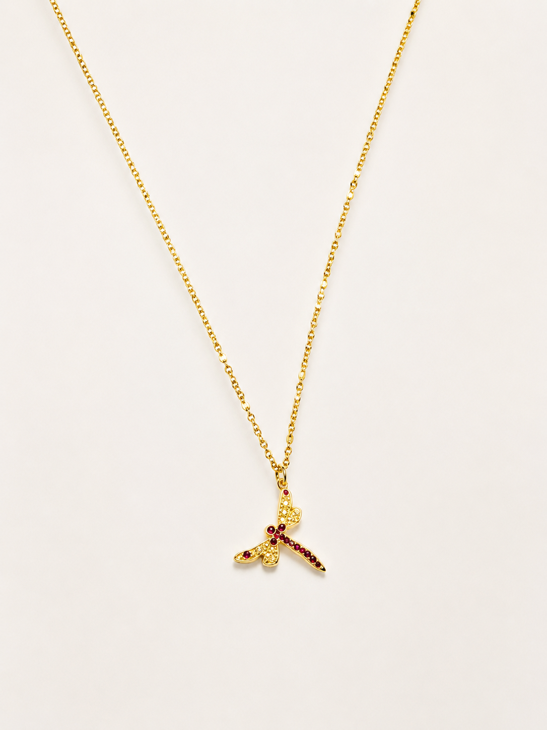 luxurious gold stainless steel necklace featuring a Swarovski crystal dragonfly pendant.