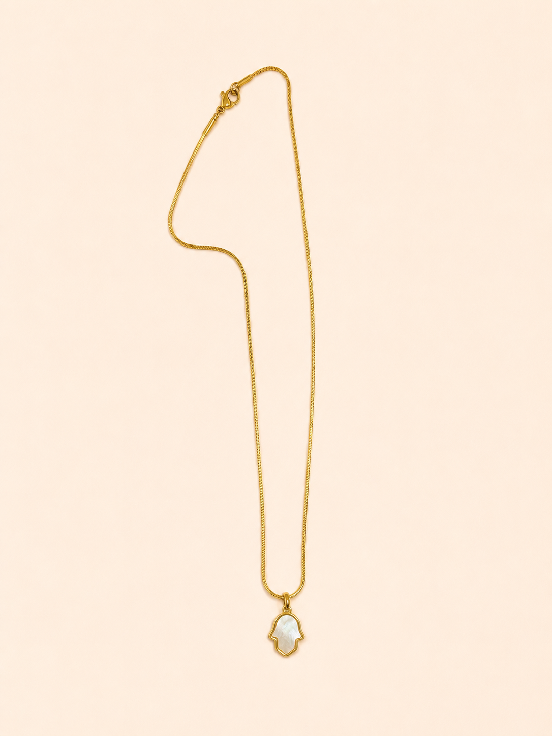 gold-plated stainless steel necklace featuring a hand-shaped pendant crafted with cultured pearls.