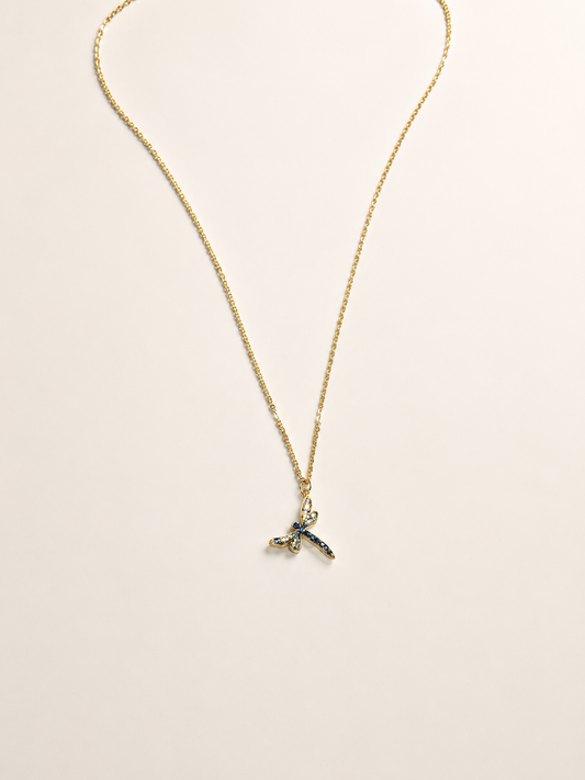 statement gold stainless steel necklace adorned with a Swarovski crystal dragonfly pendant.