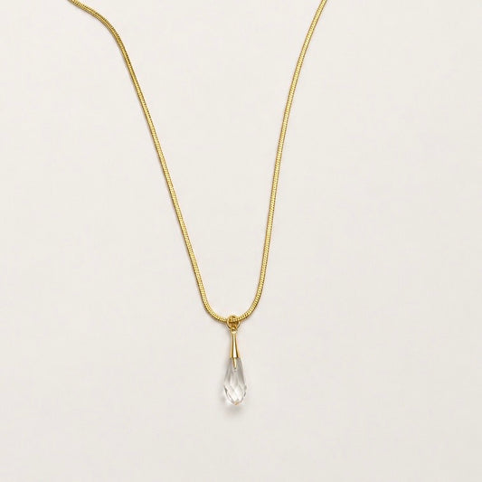 luxurious gold stainless steel necklace featuring a Swarovski crystal pendant.