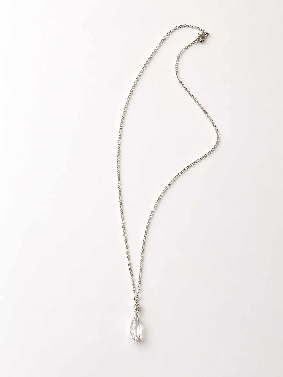 luxurious stainless steel necklace featuring a Swarovski crystal pendant.