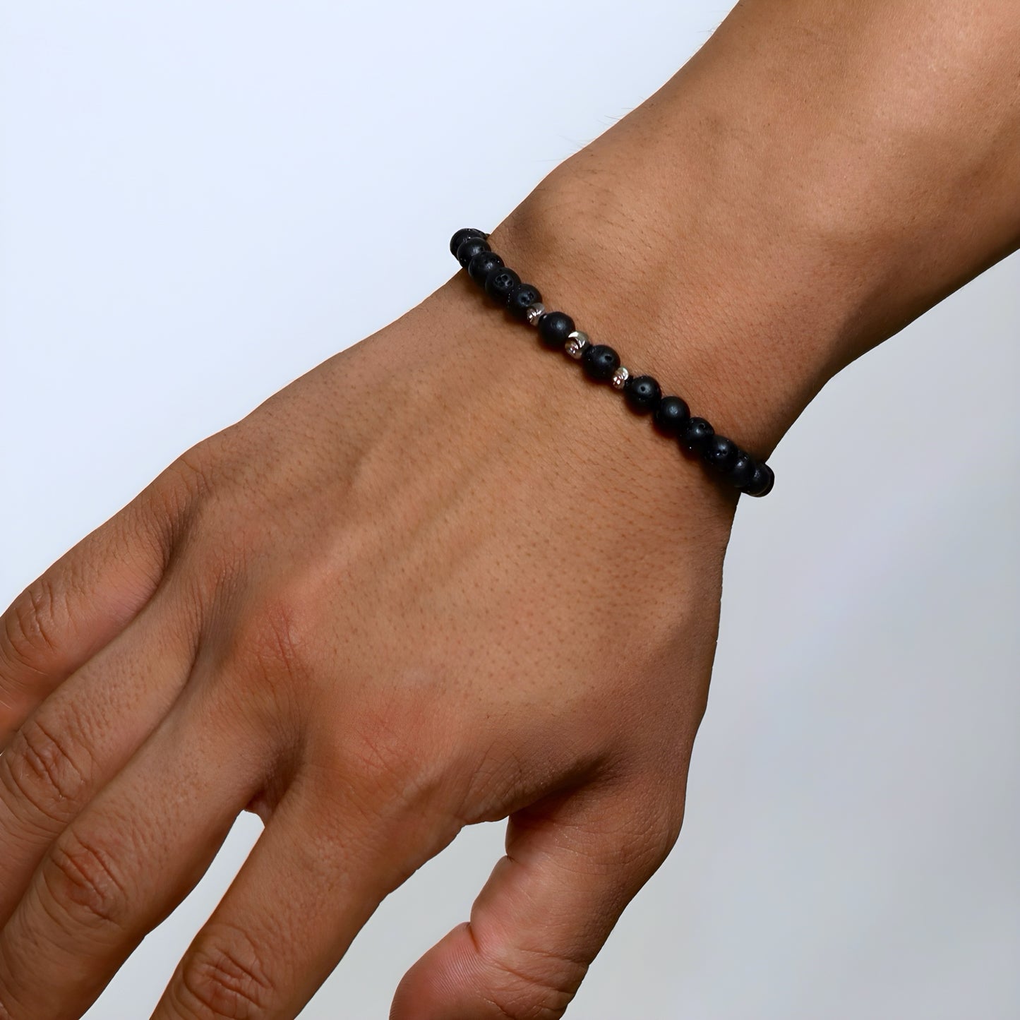 Black Lava Stone Bracelet with Silver Spacers