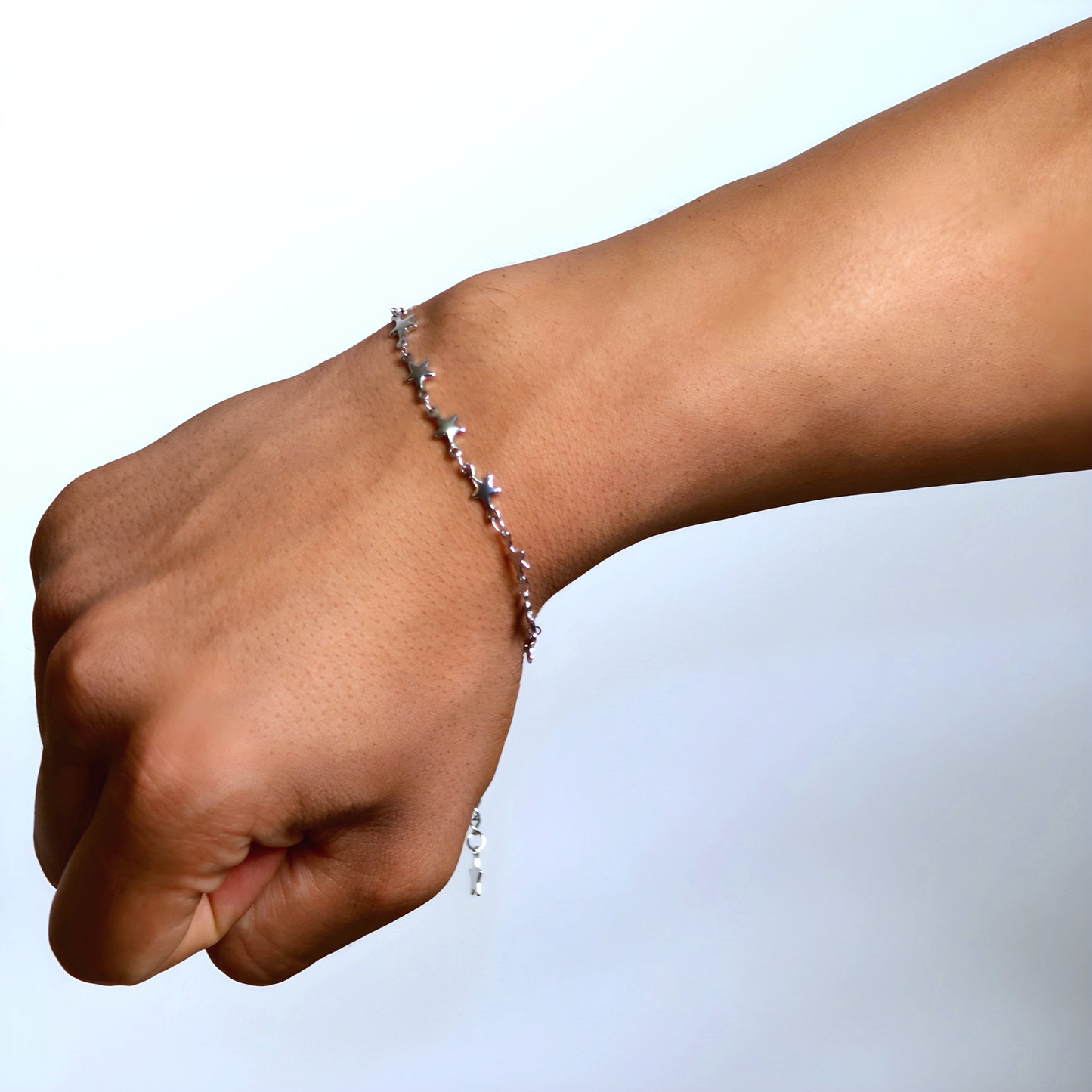 Elegant silver stainless steel bracelet adorned with delicate star details