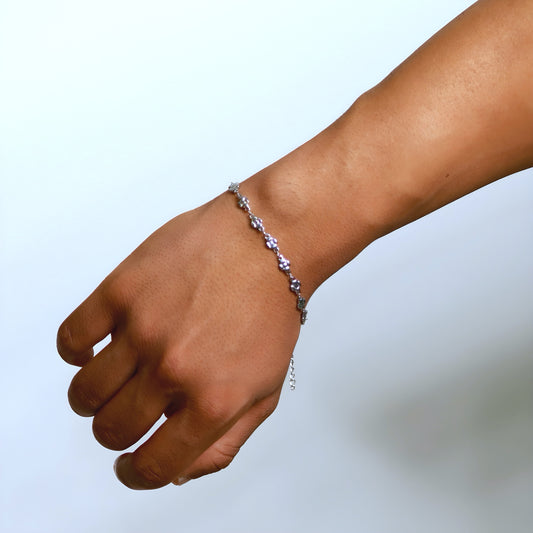 Slim and elegant stainless steel bracelet with delicate floral design